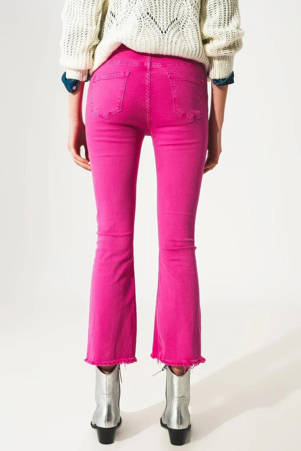 Flare Jeans With Raw Hem Edge In Fuchsia