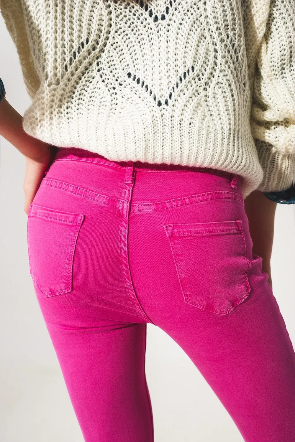 Flare Jeans With Raw Hem Edge In Fuchsia